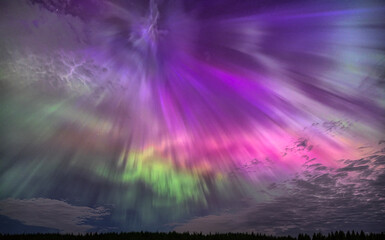 Northern Lights (Aurora Borealis) lighting up the sky on a beautiful spring night west of Ottawa,...