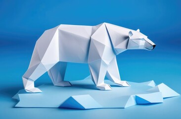 polar bear on an ice floe made of paper on a blue background. An origami figurine.