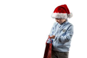 A child wearing a Santa Claus hat peeks curiously into a gift bag with a gift or purchase. Png.