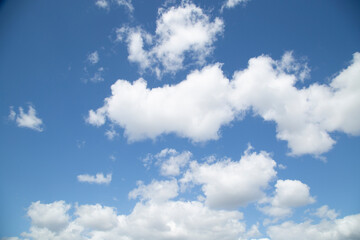 Background of a spring blue sky with clouds.Spring landscape.