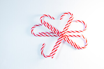Christmas candy cane in a form of a snowflake 