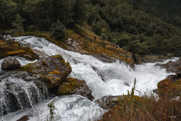 Waterfall in the mountains, near Briksdalsbreen, Norway