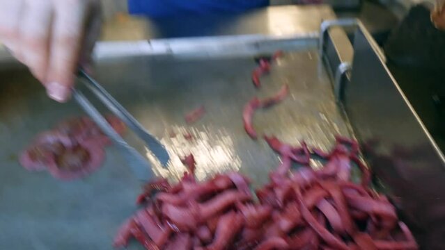 Preparation of traditional Turkish sandwich, sausage with kashar and salami.