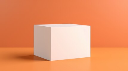 A white box is sitting on a floor in front of an orange wall