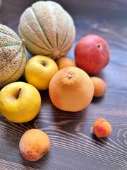 fresh fruits, melon, apricots, yellow apples, arranged fruits, grapefruit