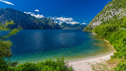 Scenic View of Malcesine on Lake Garda, Crystal Waters and Mountainous Backdrop