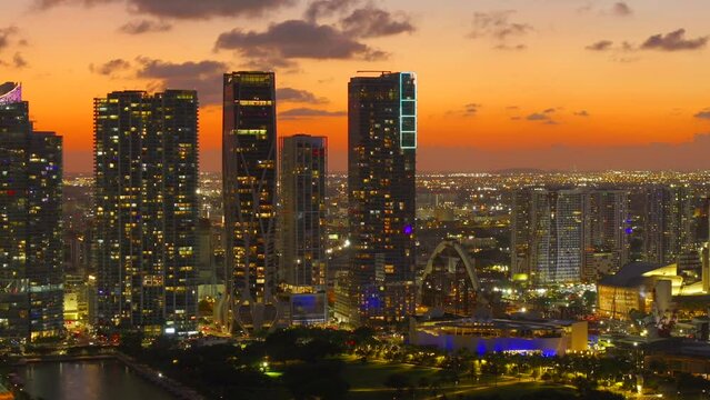 Sunset aerial drone stock video Downtown Miami logos blurred for commercial licensing