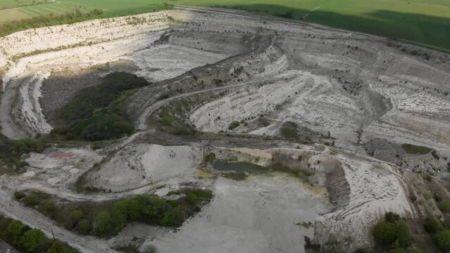 Flying over a chalk pit in Wiltshire. Chalk quarry