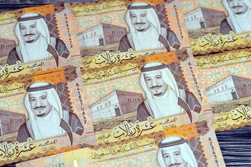 Saudi Arabia 10 SAR ten Saudi riyals cash money banknote with the photo of king Abdullah Bin...