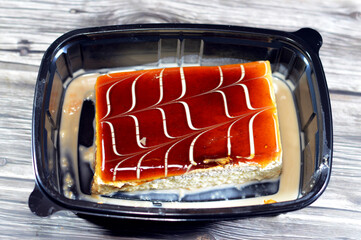 A tres leches cake, pan tres leches, a sponge cake soaked in three kinds of milk, evaporated,...