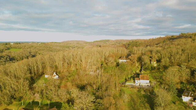 French countryside drone dropdown at golden hour in Domme France