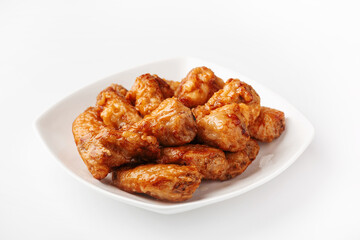 Chinese stir-fry chicken wings on a white background, isolate