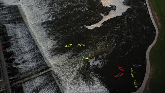 Aerial drone video group of kayakers having fun by little dam lock pretty country side in Marlow Berkshire England , river thames 