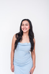 A cheerful young Asian woman wearing an elegant baby blue dress. Isolated on a clean white background, exuding a friendly vibe.