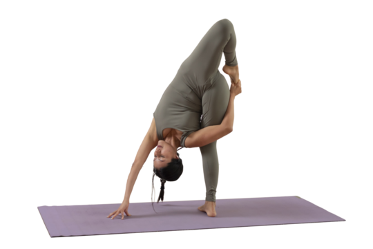 Young mexican woman doing headstand yoga poses