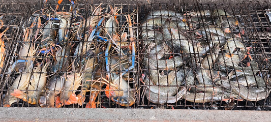 shrimp prawn on a barbecue grill. Barbecue grilled seafood.