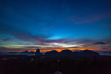 wonderful sunrise natural Landscape above Samed Nang Chee Phang Nga viewpoint. .amazing bright sky at twilight. Beautiful sunrise tropical landscape background..popular landmark of Phang Nga