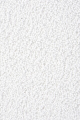 white balls creating abstract texture or background.