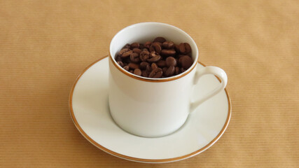 Coffee beans in a white cup inspired by a cafe