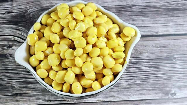 A pile of Lupinus Albus commonly known as white lupin or field lupine and called in Egypt as Termes which is a popular street snack after treated with several soakings of water, salt, cumin and lemon