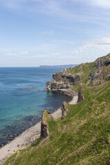 Clear Blue Coastal Waters and Rocky Shoreline