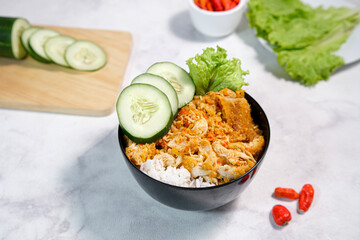 Spicy Smashed Crispy Chicken or Ayam Geprek Indonesian Food