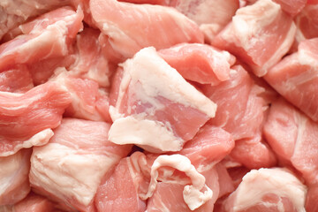 Raw pork meat. Fresh meat cubes. Diced pork. 