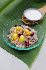 Sweet black sticky rice with grains. Thai dessert