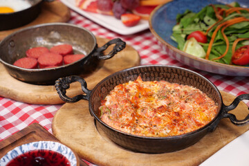 Turkish Menemen omelet in a frying pan. .