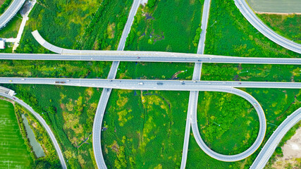 Aerial view of  expressway in the urban traffic way with green background.