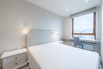 Minimalism Bedroom Interior. Window, Chair and Table in Background.