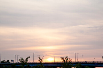 Obraz premium View of the dusk during sunset over the bridge