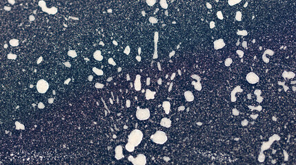 Dirt on the body of a black car. Abstract background