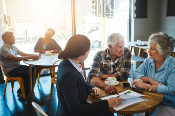 Senior couple, legal advisor and talking in meeting, relax conversation and estate planning or legacy policy. Insurance, asset management and professional, pensioner people and discussion in cafe