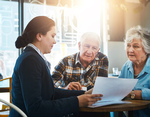 Senior couple, financial advisor and meeting with paperwork in consultation, conversation and...