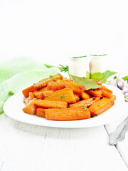 Carrots fried in plate on white board