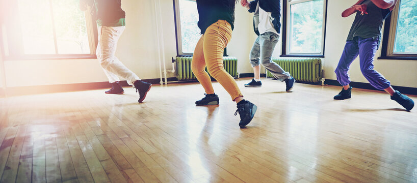 Dancer group, feet and hip hop for breakdance with friends to practice for performance or competition. People, team and dancing class to learn together in rehearsal to plan steps and formation