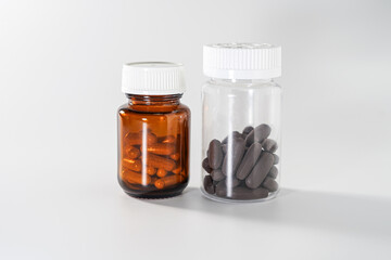 several bottles containing pills and capsules