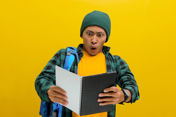An excited young Asian student, dressed in a beanie hat and casual shirt, carrying a backpack,...