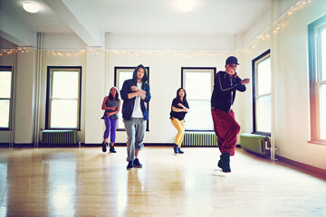 Breakdance, culture and team in dance studio with group for rehearsal or practice with energy for...