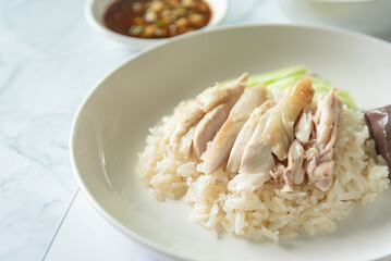 Closed up chicken garlic rice with black soybean and soup, Singapore famous street food