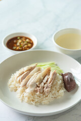 Closed up chicken garlic rice with black soybean and soup, Singapore famous street food