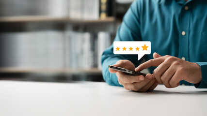 customer man using smartphone express satisfaction Golden five star level Excellent level Provide service quality ratings, business reputation ratings.