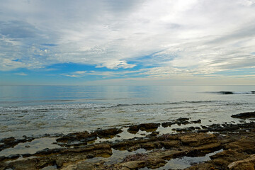 Beautiful evening sky over the sea on the shore of the city of Torrevieja in Spain	