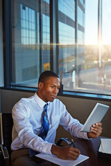 Fototapeta premium Businessman, writing and book with tablet for finance, legal paperwork or budget planning at office. Black man, financial advisor or accountant taking notes with technology for tasks, report or audit