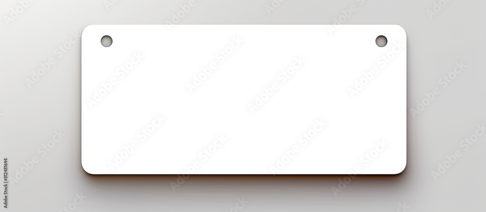 Aufkleber blank name tag against a white backdrop providing room for adding text creating a copy space image