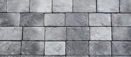 Obraz premium Aerial view of square concrete paving stones with copy space in the image