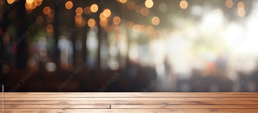 Leinwandbilder coffee shop blur background with bokeh and an empty wooden table providing copy space for images