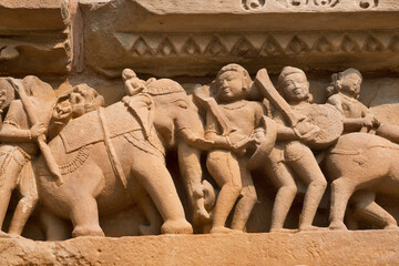 Khajuraho, India: World-famous reliefs on temple facades. Sandstone temples date back to the 10th...