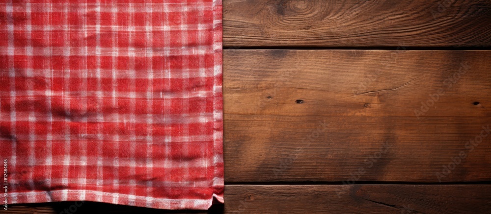 Poster a wooden background with a kitchen cloth napkin available for use and a space for additional content